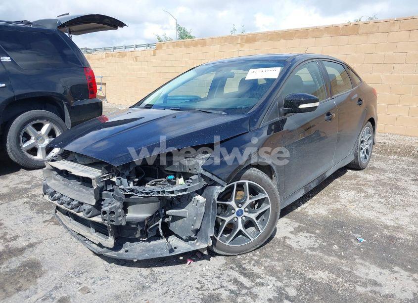 Photo 2 of 2016 Ford Focus SE (VIN 1FADP3F29GL209601)