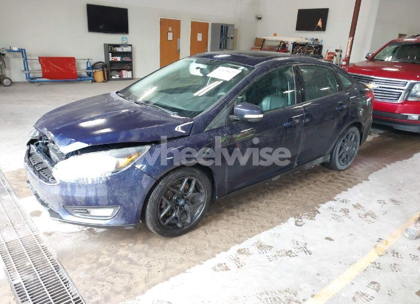 Photo 2 of 2016 Ford Focus SE (VIN 1FADP3F29GL242792)