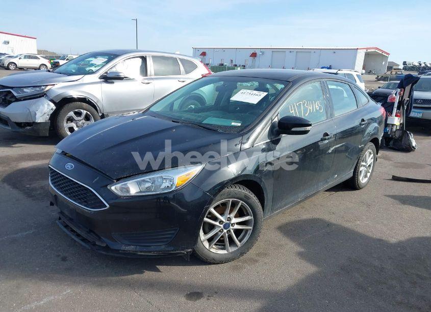 Photo 2 of 2016 Ford Focus SE (VIN 1FADP3F29GL255879)
