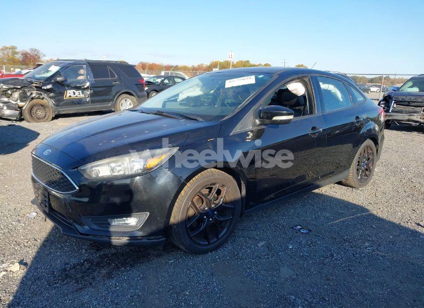 Photo 2 of 2016 Ford Focus SE (VIN 1FADP3F29GL260872)