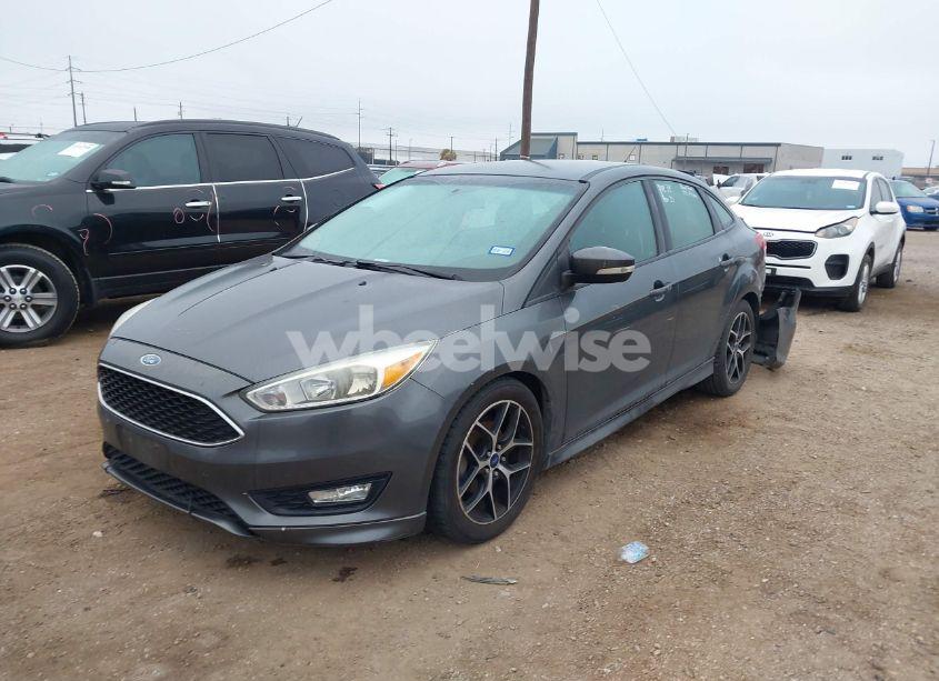 Photo 2 of 2016 Ford Focus SE (VIN 1FADP3F29GL391381)