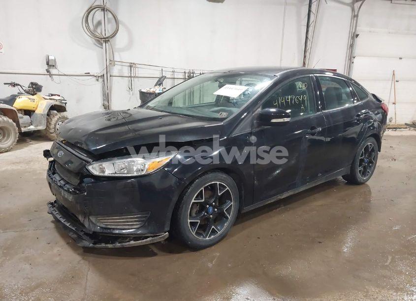 Photo 2 of 2016 Ford Focus SE (VIN 1FADP3F29GL403352)