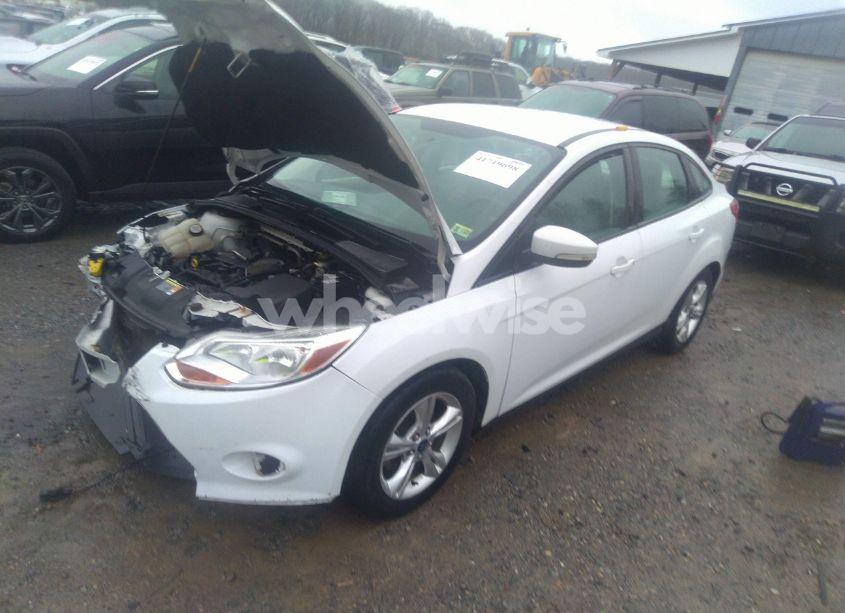 Photo 2 of 2013 Ford Focus SE (VIN 1FADP3F2XDL188625)