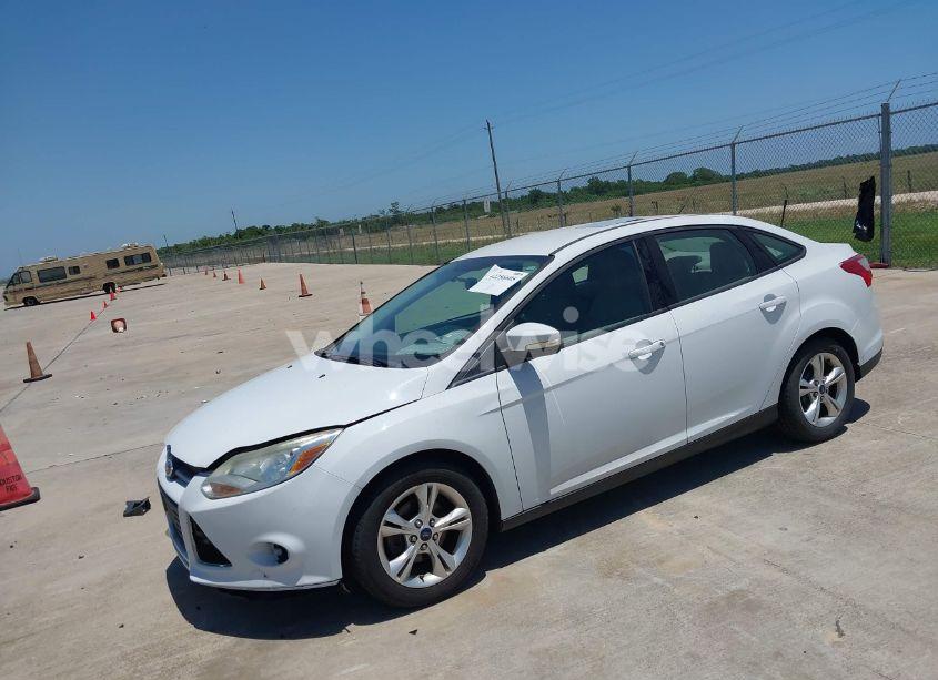 Photo 2 of 2013 Ford Focus SE (VIN 1FADP3F2XDL251450)