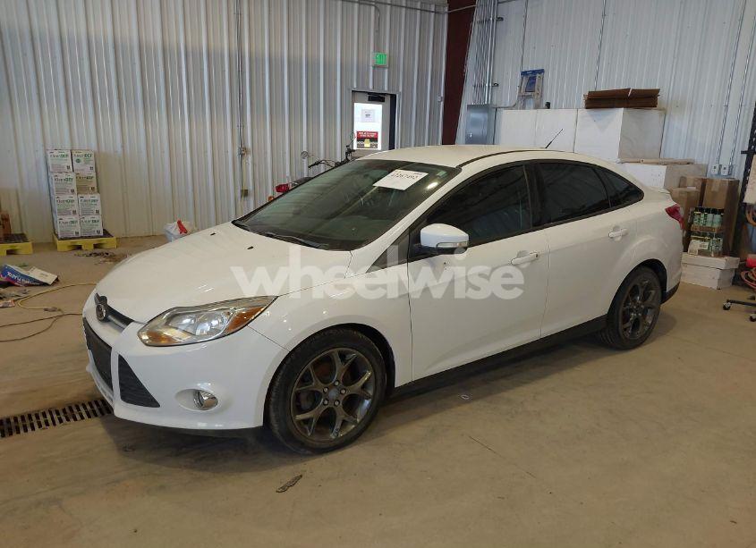Photo 2 of 2013 Ford Focus SE (VIN 1FADP3F2XDL255868)