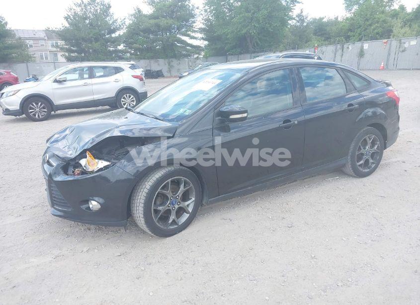 Photo 2 of 2013 Ford Focus SE (VIN 1FADP3F2XDL354156)