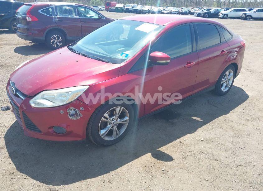 Photo 2 of 2013 Ford Focus SE (VIN 1FADP3F2XDL371376)