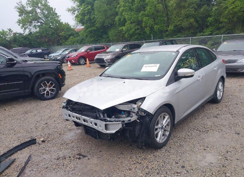 Photo 2 of 2017 Ford Focus SE (VIN 1FADP3F2XHL320241)