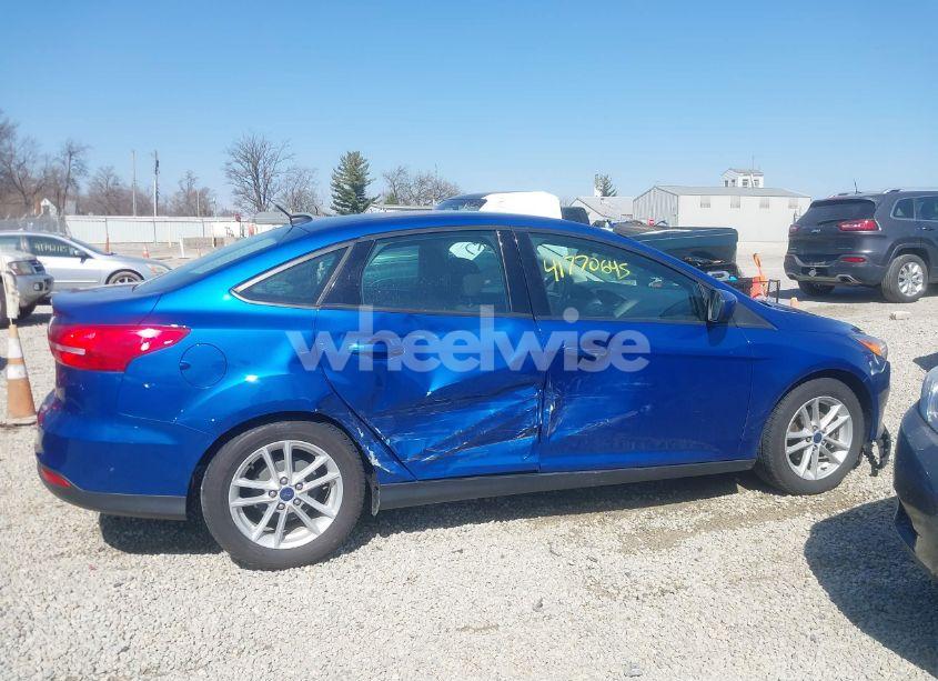 Photo 13 of 2018 Ford Focus SE (VIN 1FADP3F2XJL228553)