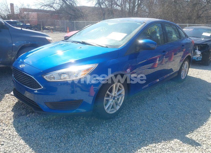Photo 2 of 2018 Ford Focus SE (VIN 1FADP3F2XJL228553)