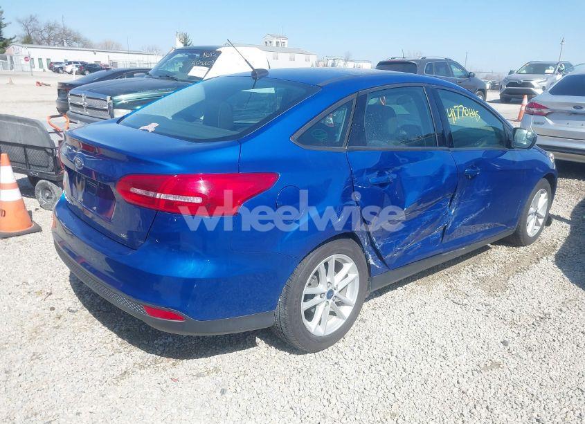 Photo 4 of 2018 Ford Focus SE (VIN 1FADP3F2XJL228553)