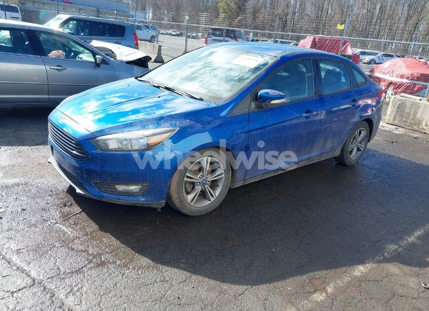 Photo 2 of 2018 Ford Focus SE (VIN 1FADP3F2XJL290888)
