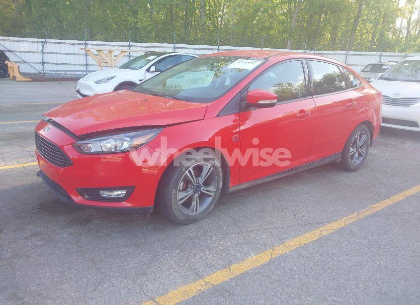 Photo 2 of 2016 Ford Focus SE (VIN 1FADP3FE1GL378019)