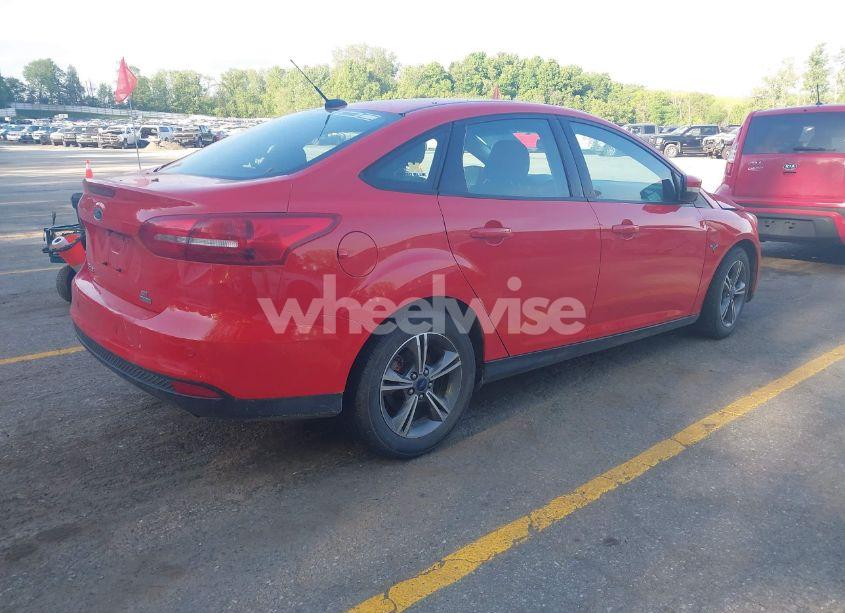 Photo 4 of 2016 Ford Focus SE (VIN 1FADP3FE1GL378019)