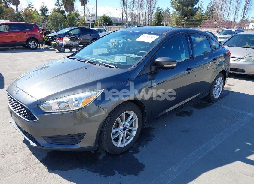 Photo 2 of 2017 Ford Focus SE (VIN 1FADP3FE1HL237582)
