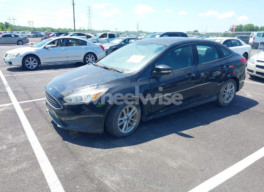 Photo 2 of 2017 Ford Focus SE (VIN 1FADP3FE1HL269626)