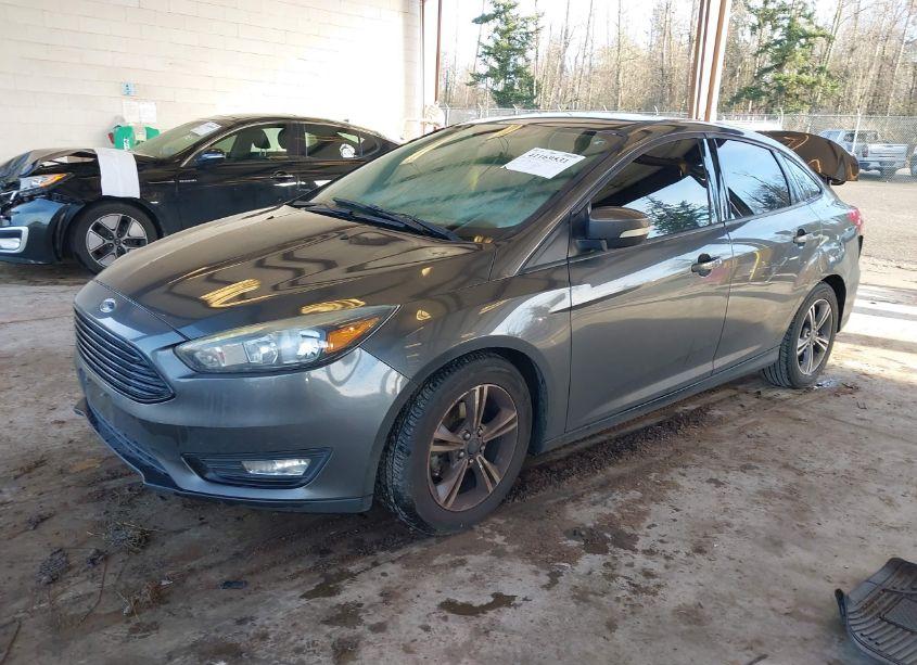 Photo 2 of 2017 Ford Focus SE (VIN 1FADP3FE1HL277788)