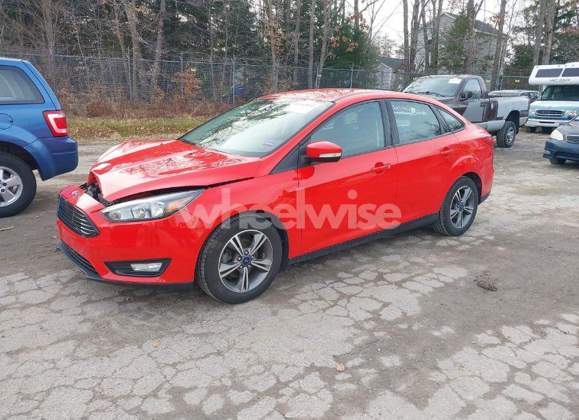 Photo 2 of 2017 Ford Focus SE (VIN 1FADP3FE2HL273992)