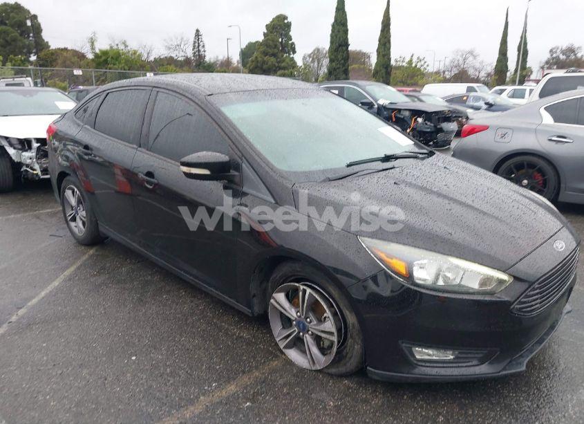 Photo 13 of 2017 Ford Focus SE (VIN 1FADP3FE2HL296009)