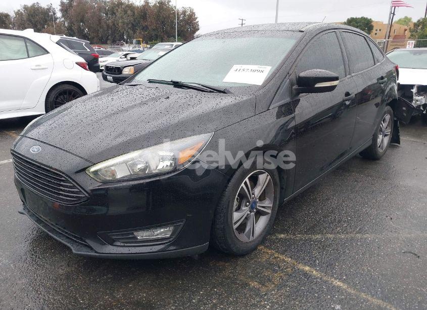 Photo 2 of 2017 Ford Focus SE (VIN 1FADP3FE2HL296009)