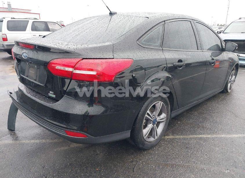 Photo 4 of 2017 Ford Focus SE (VIN 1FADP3FE2HL296009)