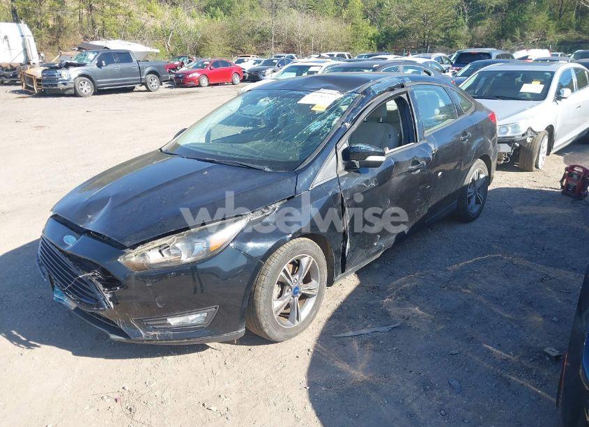 Photo 2 of 2017 Ford Focus SE (VIN 1FADP3FE2HL316131)