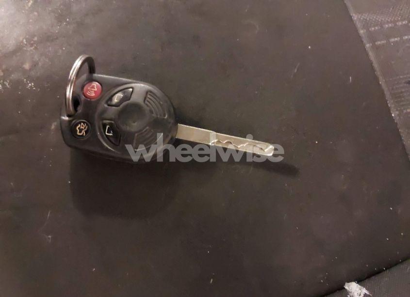 Photo 11 of 2018 Ford Focus SE (VIN 1FADP3FE2JL200014)