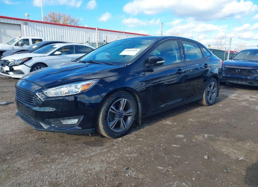 Photo 2 of 2016 Ford Focus SE (VIN 1FADP3FE3GL220619)