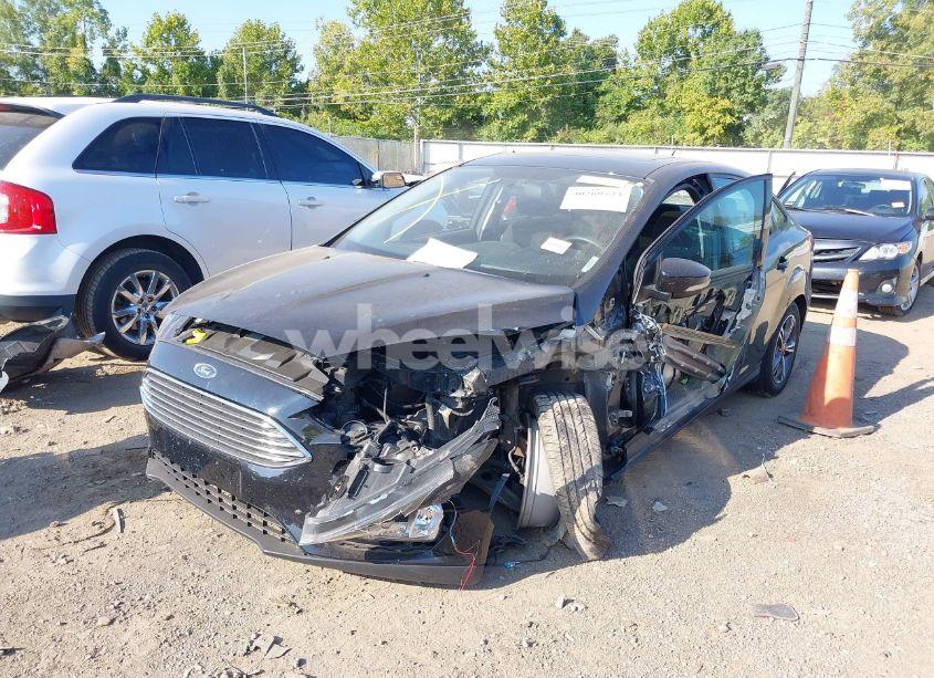 Photo 2 of 2016 Ford Focus SE (VIN 1FADP3FE3GL296891)