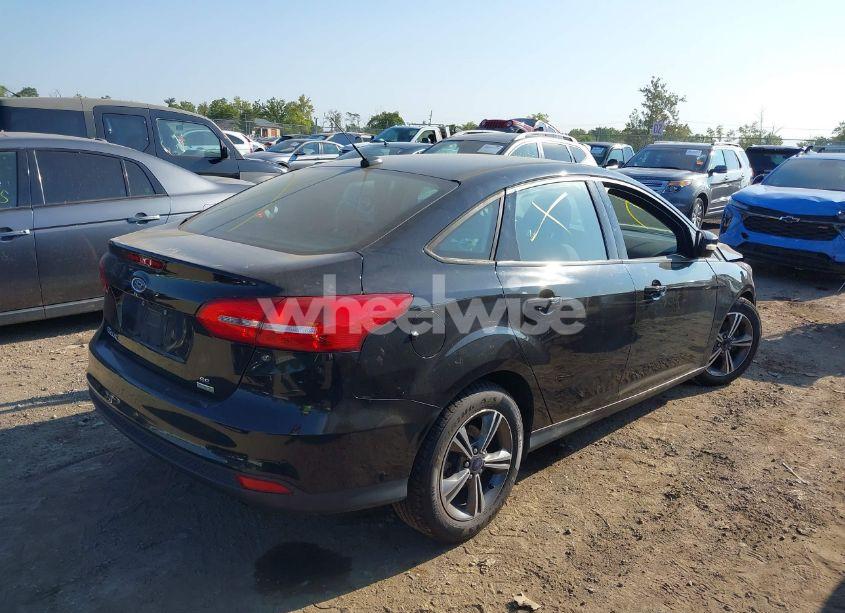 Photo 4 of 2016 Ford Focus SE (VIN 1FADP3FE3GL296891)