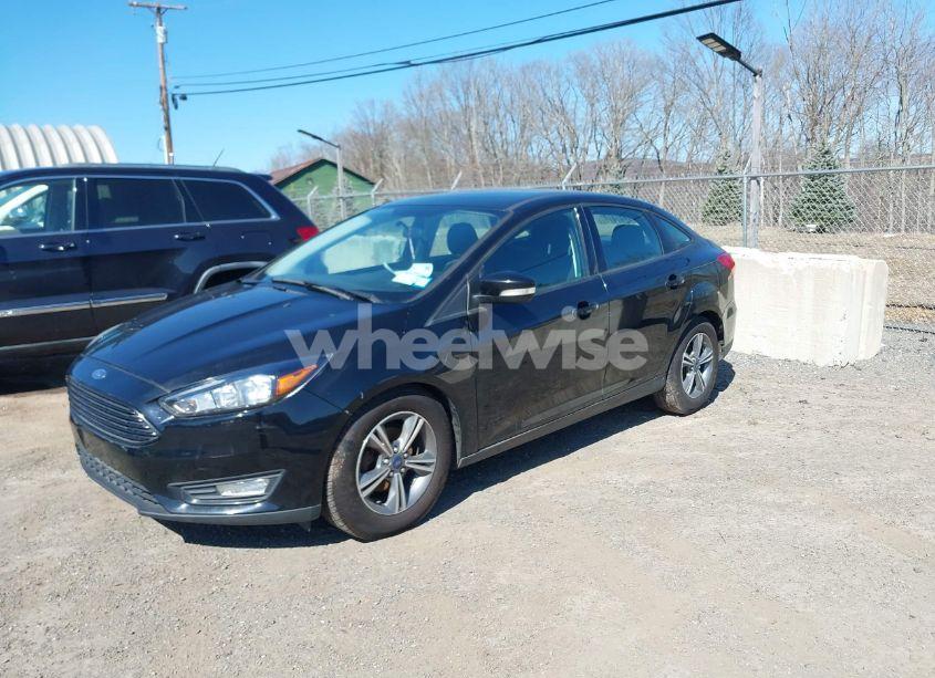 Photo 2 of 2017 Ford Focus SE (VIN 1FADP3FE3HL212196)