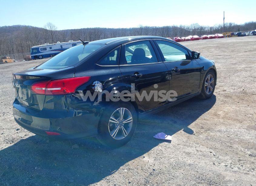 Photo 4 of 2017 Ford Focus SE (VIN 1FADP3FE3HL212196)