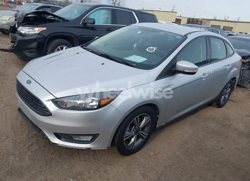 Photo 2 of 2017 Ford Focus SE (VIN 1FADP3FE3HL270504)