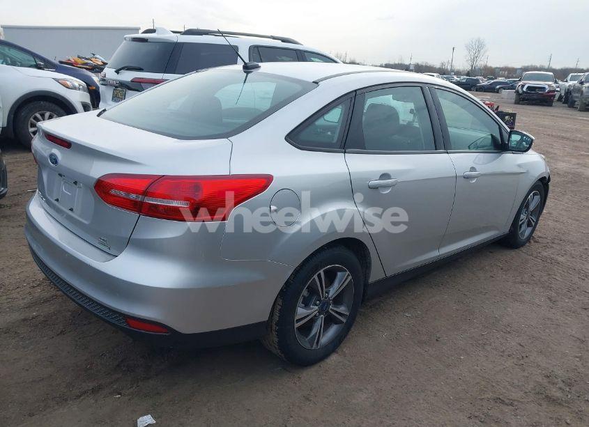 Photo 4 of 2017 Ford Focus SE (VIN 1FADP3FE3HL270504)