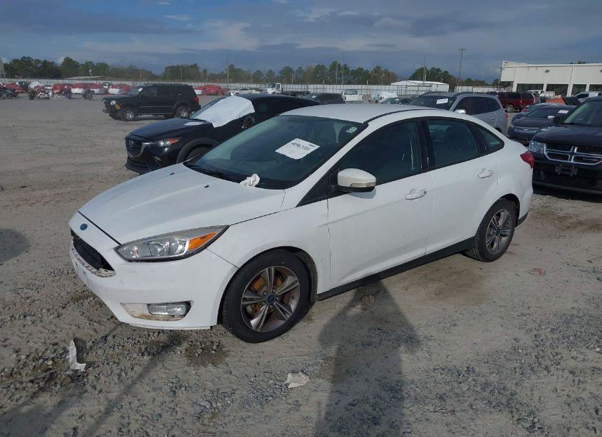 Photo 2 of 2017 Ford Focus SE (VIN 1FADP3FE3HL294057)