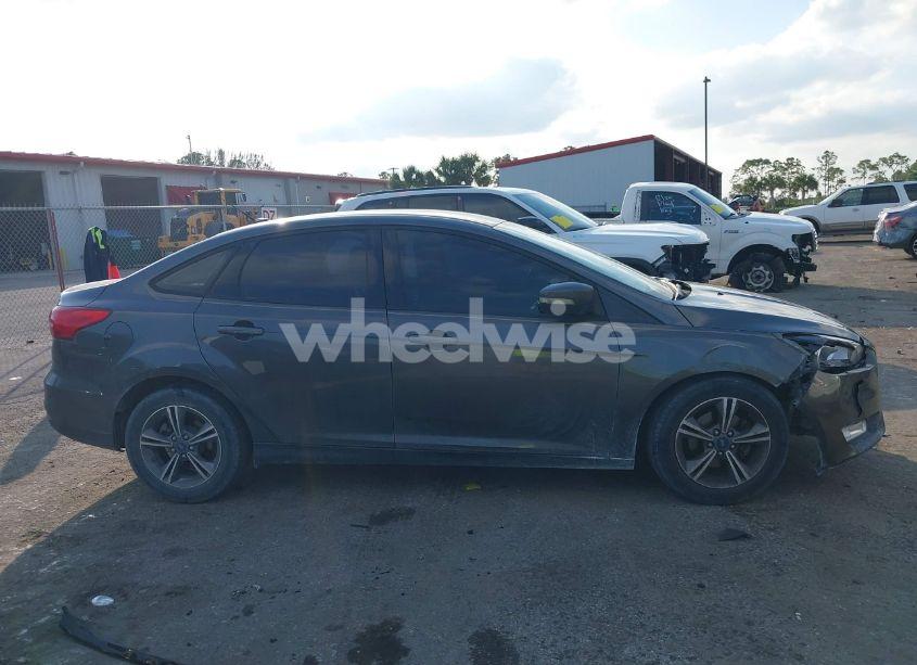 Photo 14 of 2017 Ford Focus SE (VIN 1FADP3FE3HL306451)