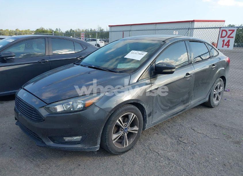 Photo 2 of 2017 Ford Focus SE (VIN 1FADP3FE3HL306451)