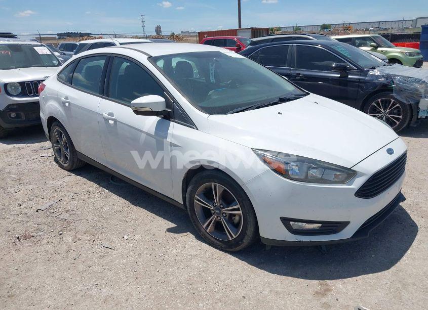 2017 Ford Focus SE (VIN 1FADP3FE5HL299907) main photo