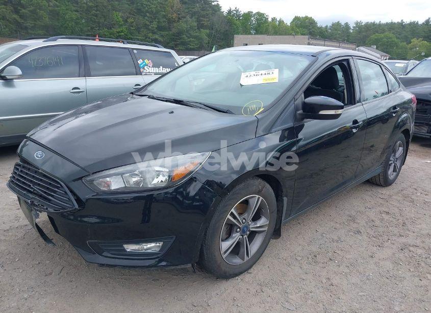 Photo 2 of 2017 Ford Focus SE (VIN 1FADP3FE5HL316446)