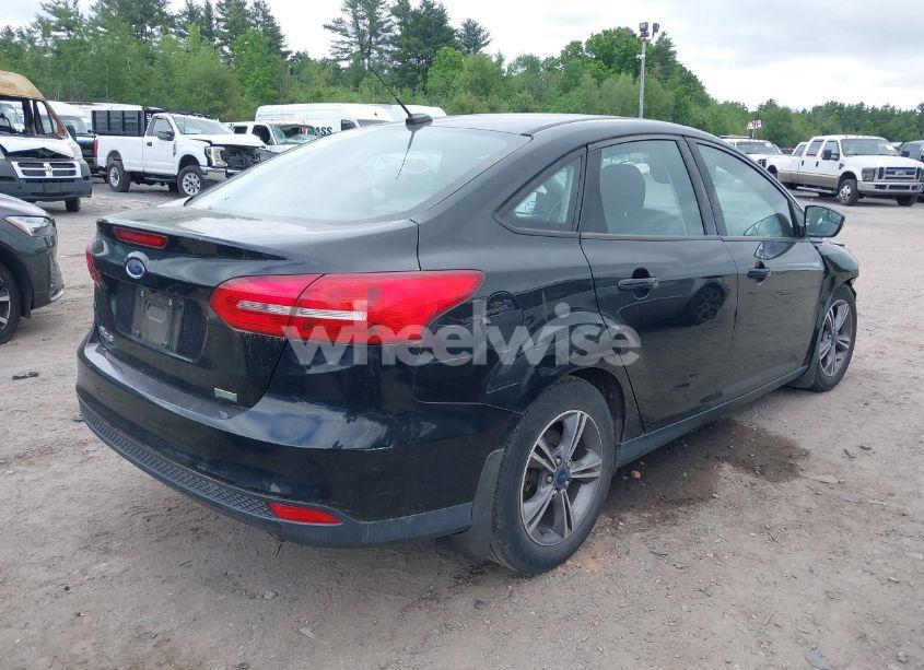 Photo 4 of 2017 Ford Focus SE (VIN 1FADP3FE5HL316446)