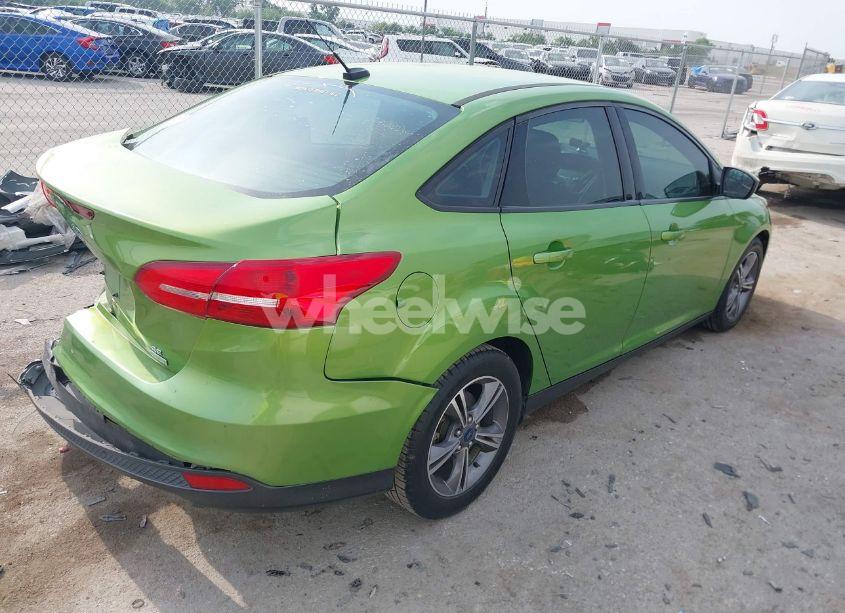 Photo 4 of 2018 Ford Focus SE (VIN 1FADP3FE5JL222542)