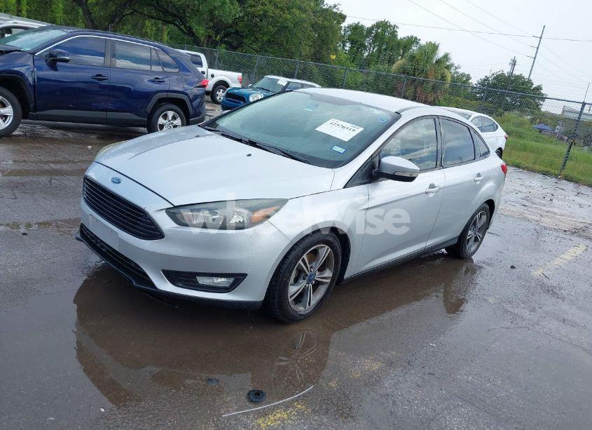 Photo 2 of 2016 Ford Focus SE (VIN 1FADP3FE7GL406809)