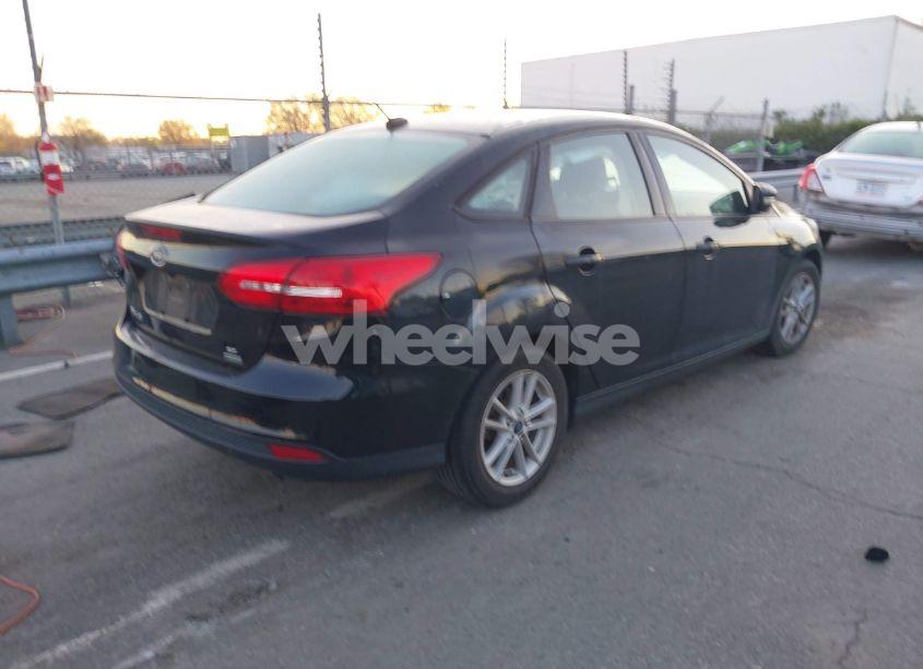 Photo 4 of 2017 Ford Focus SE (VIN 1FADP3FE7HL298287)