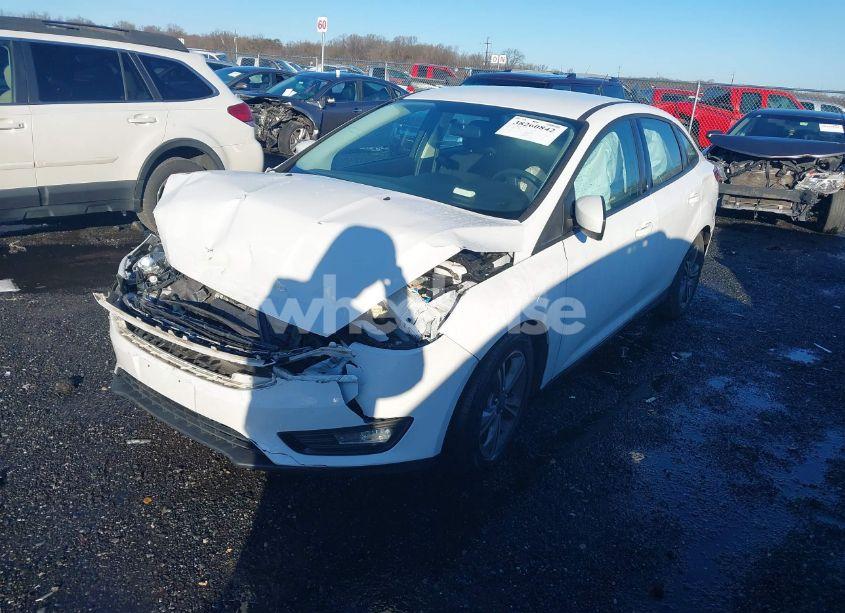 Photo 2 of 2018 Ford Focus SE (VIN 1FADP3FE7JL234806)