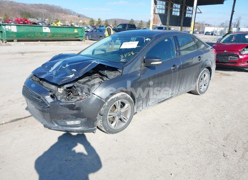 Photo 2 of 2017 Ford Focus SE (VIN 1FADP3FE8HL243458)