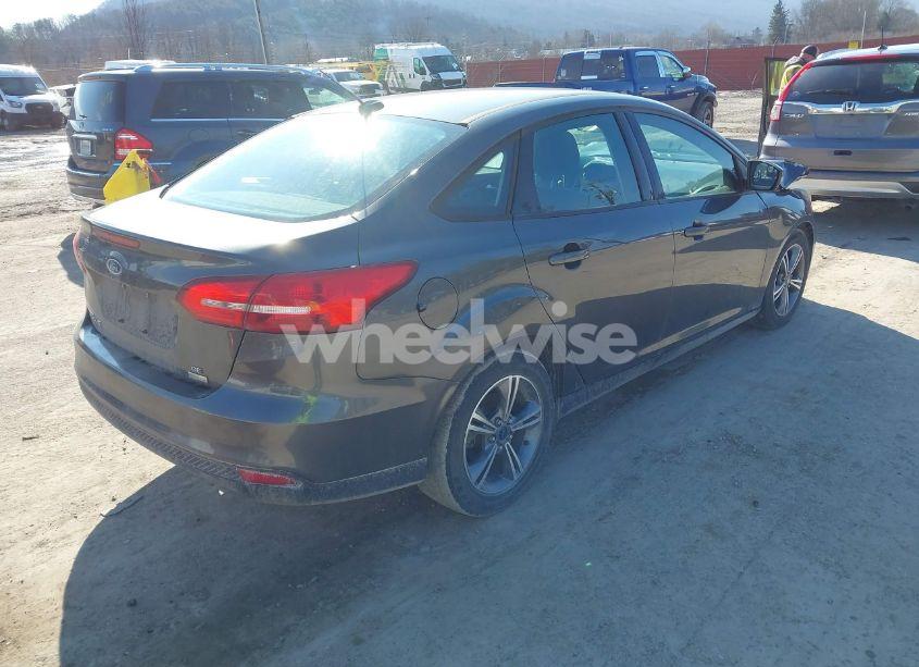 Photo 4 of 2017 Ford Focus SE (VIN 1FADP3FE8HL243458)