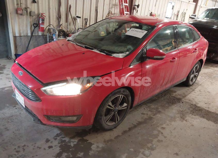 Photo 2 of 2017 Ford Focus SE (VIN 1FADP3FE8HL280980)