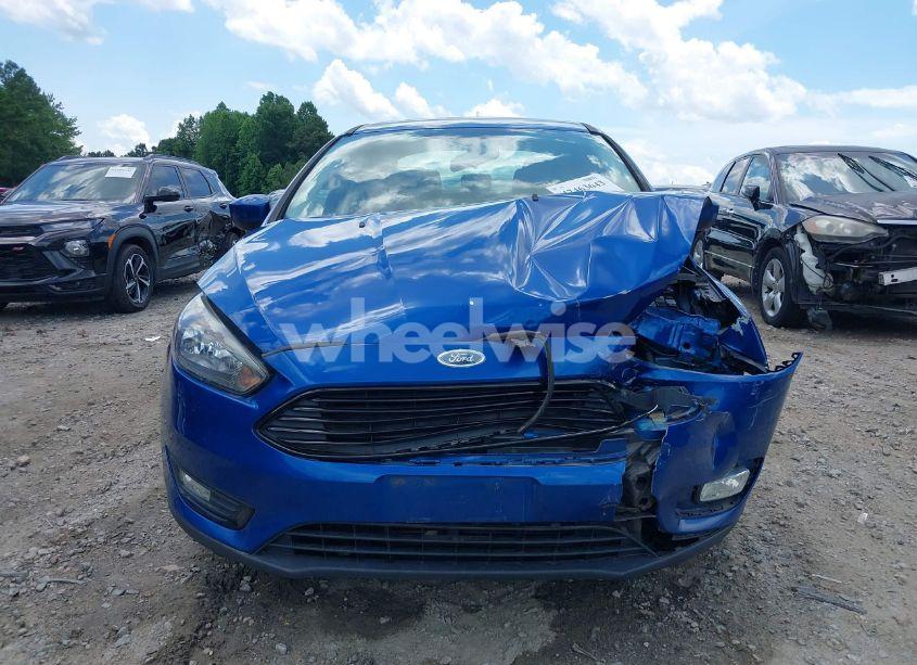 Photo 12 of 2018 Ford Focus SE (VIN 1FADP3FE8JL238024)