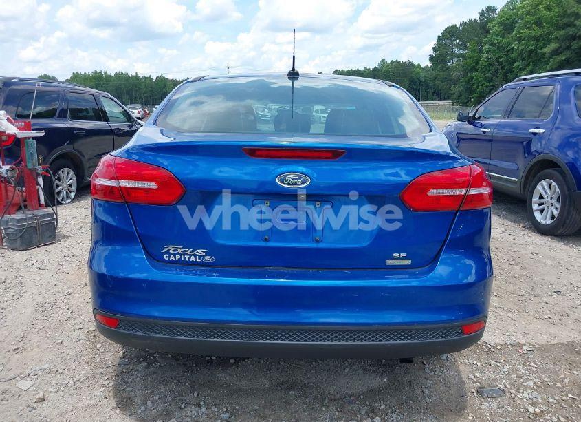 Photo 16 of 2018 Ford Focus SE (VIN 1FADP3FE8JL238024)