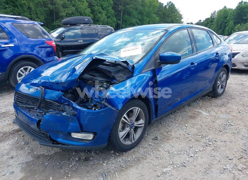 Photo 2 of 2018 Ford Focus SE (VIN 1FADP3FE8JL238024)
